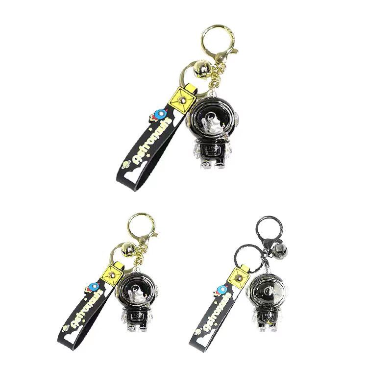 MINISO Astronauts Black & Gold Liquid Keychain
