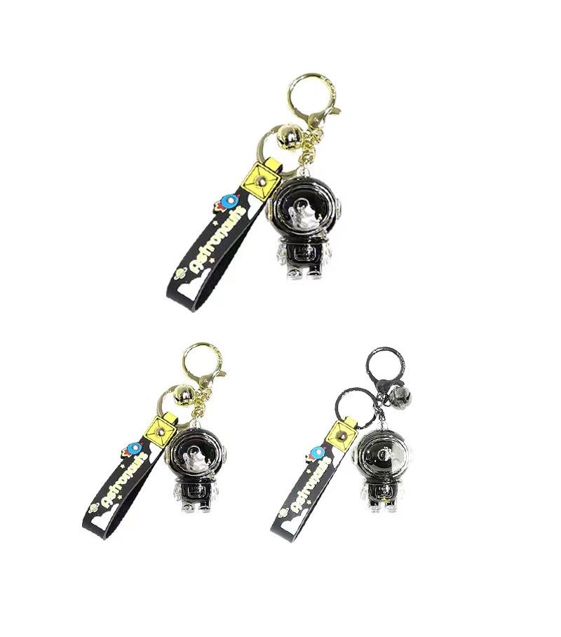 MINISO Astronauts Black & Gold Liquid Keychain